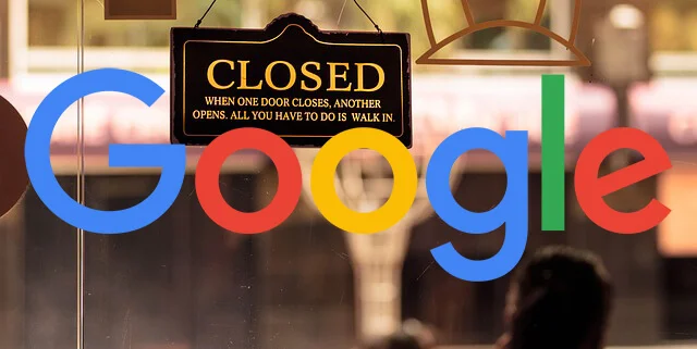 Google logo hanging in the window with a closed sign